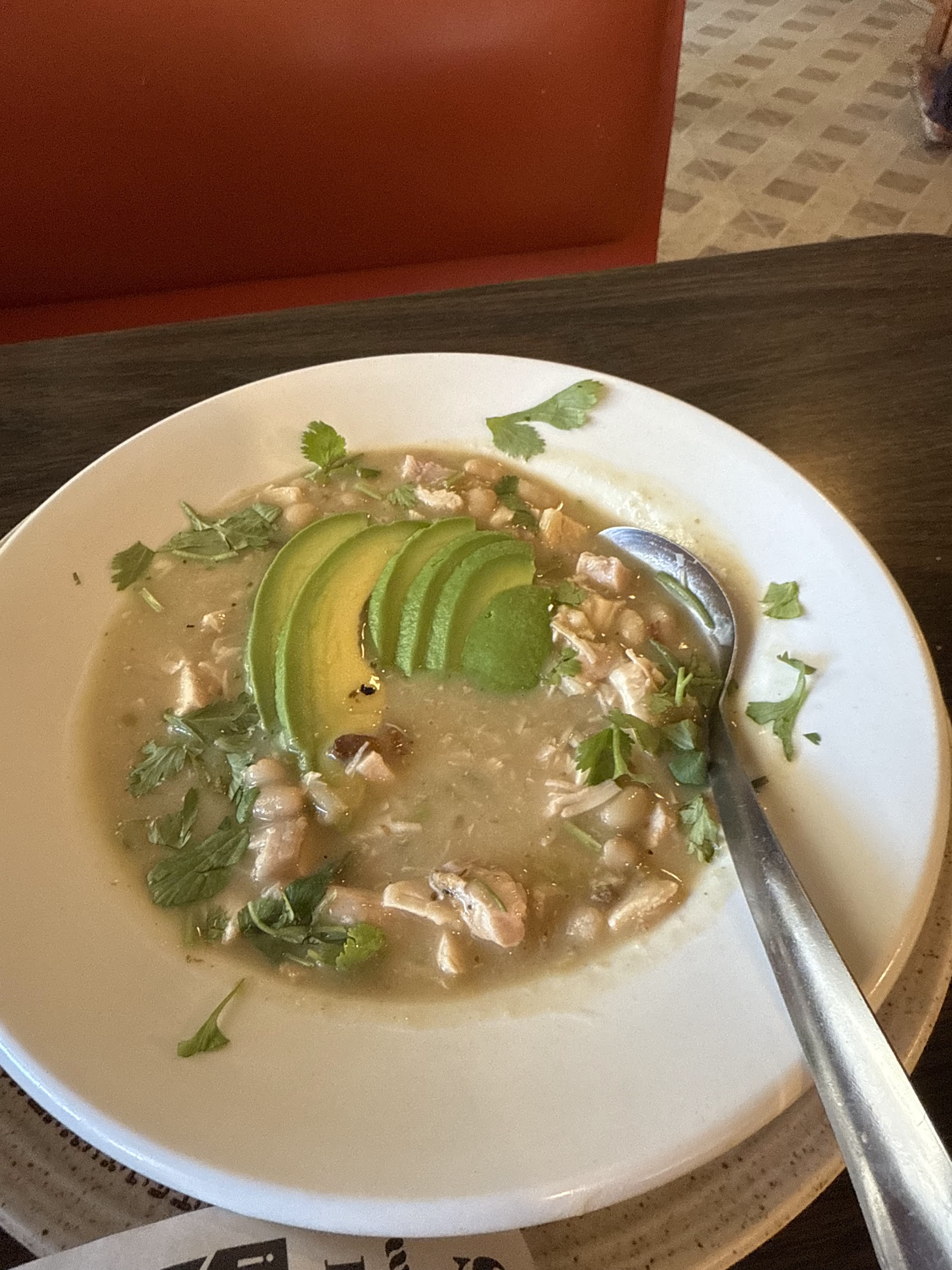 Chicken avocado soup with white beans and fresh cilantro